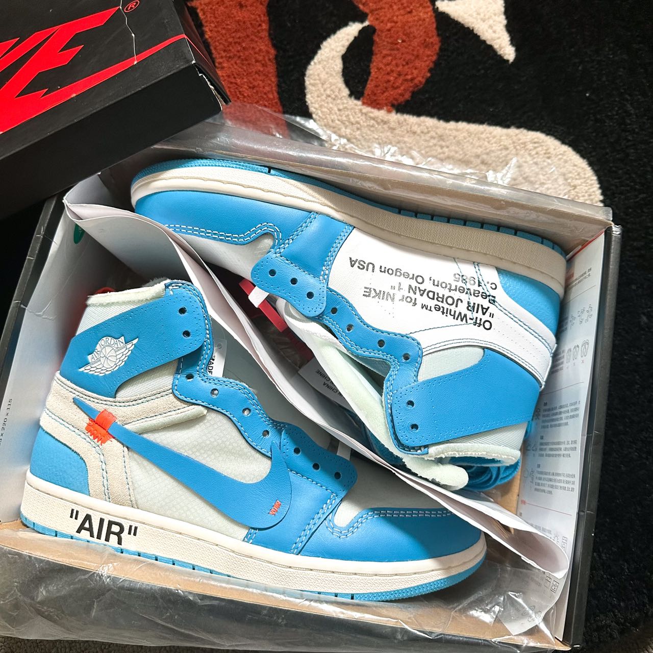 Nike air jordan 1 hot sale x off white unc